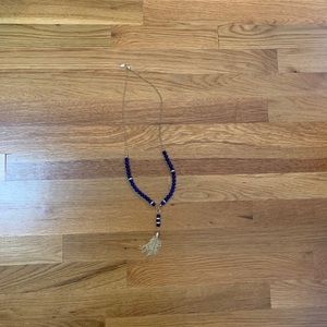Gold tassel necklace